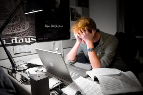 required stock photo of a frustrated office worker. Image by Peter A. Hess